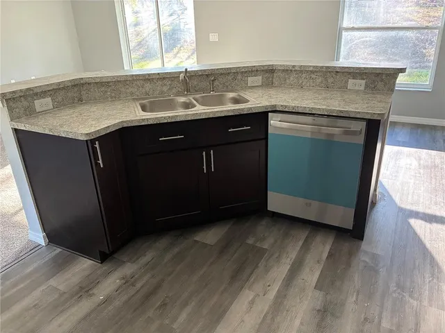 a utility room with washer and dryer
