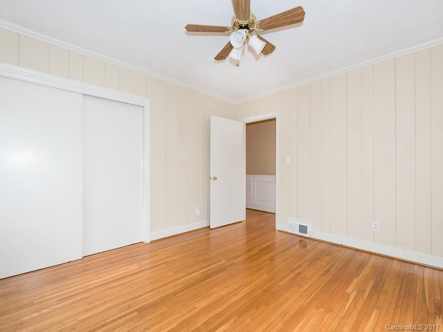 5600 Robinhood Road Charlotte, NC 28211 - Photo 14 of 22 a view of empty room with wooden floor