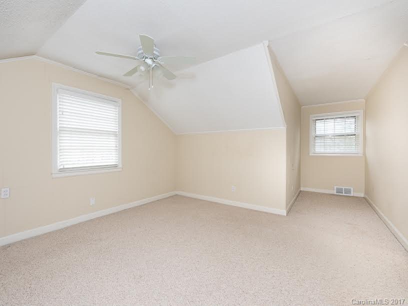 5600 Robinhood Road Charlotte, NC 28211 - Photo 16 of 22 an empty room with windows and closet