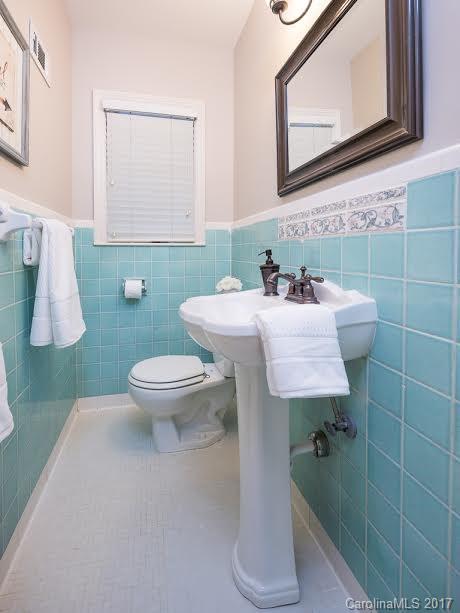 5600 Robinhood Road Charlotte, NC 28211 - Photo 17 of 22 a bathroom with a sink toilet and mirror