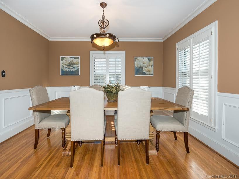5600 Robinhood Road Charlotte, NC 28211 - Photo 6 of 22 a view of a dining room with furniture window and wooden floor