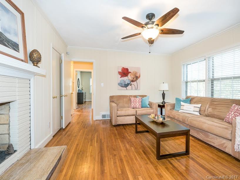 5600 Robinhood Road Charlotte, NC 28211 - Photo 8 of 22 a living room with furniture and a large window
