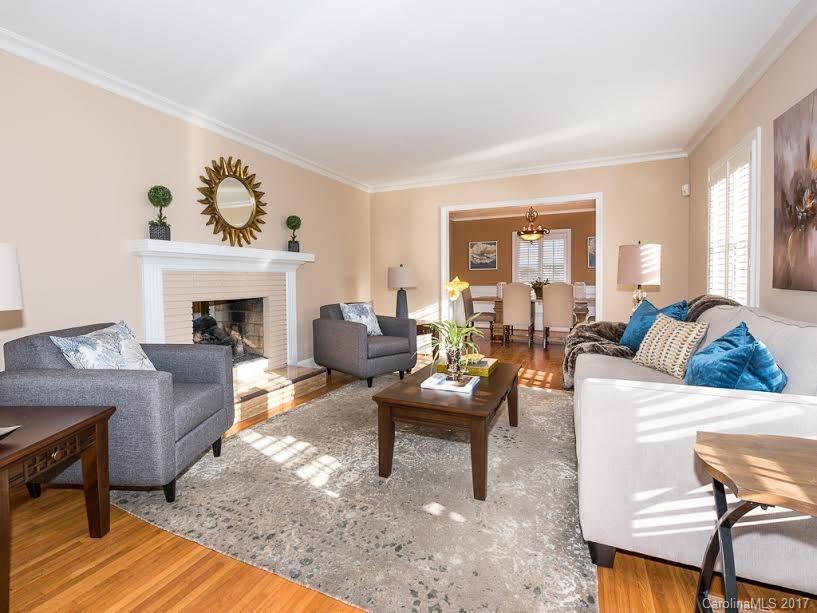 5600 Robinhood Road Charlotte, NC 28211 - Photo 10 of 22 a living room with furniture and a fireplace