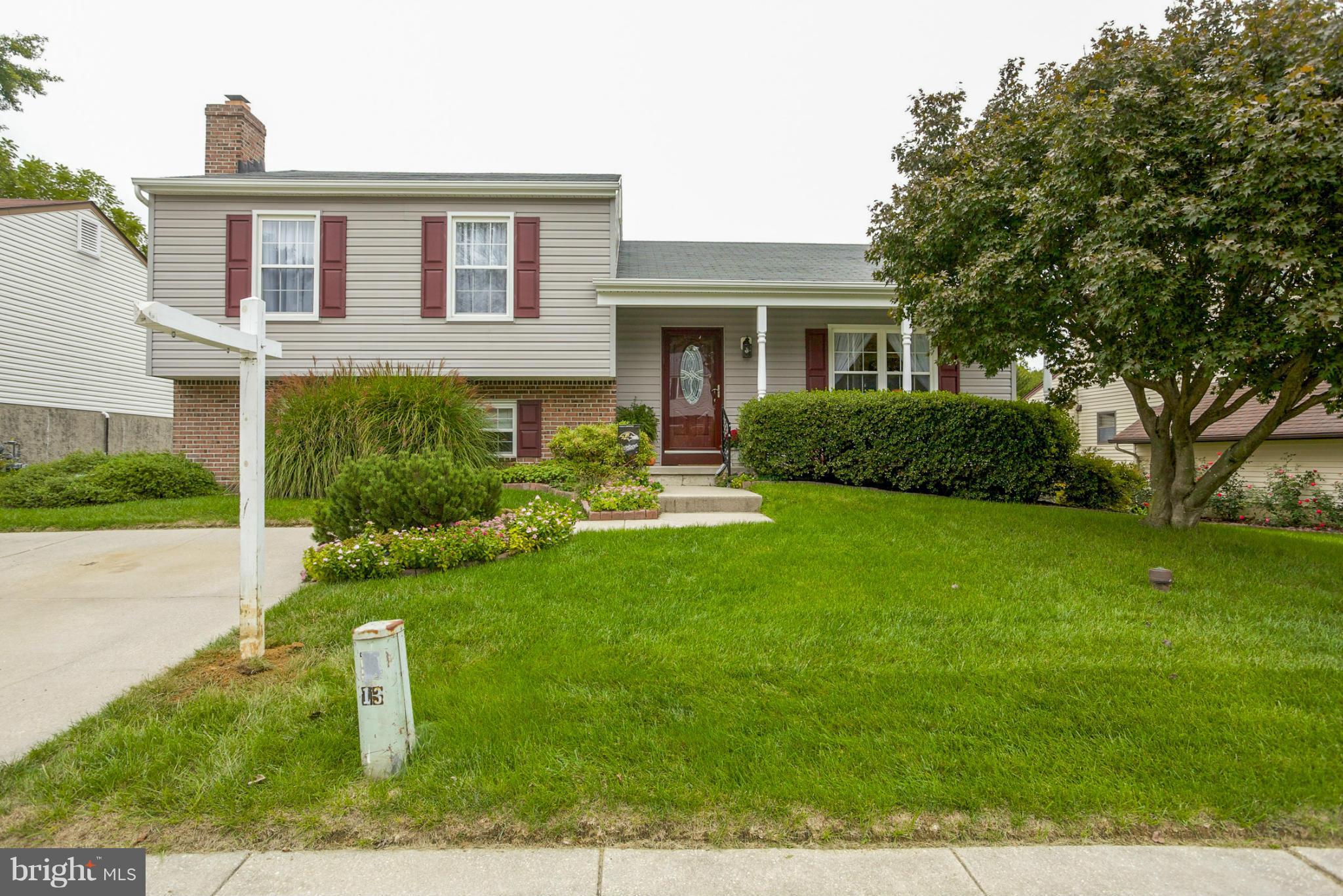 9407 Oak White Road Baltimore, MD 21236 - Photo 1 of 30 a front view of a house with a yard
