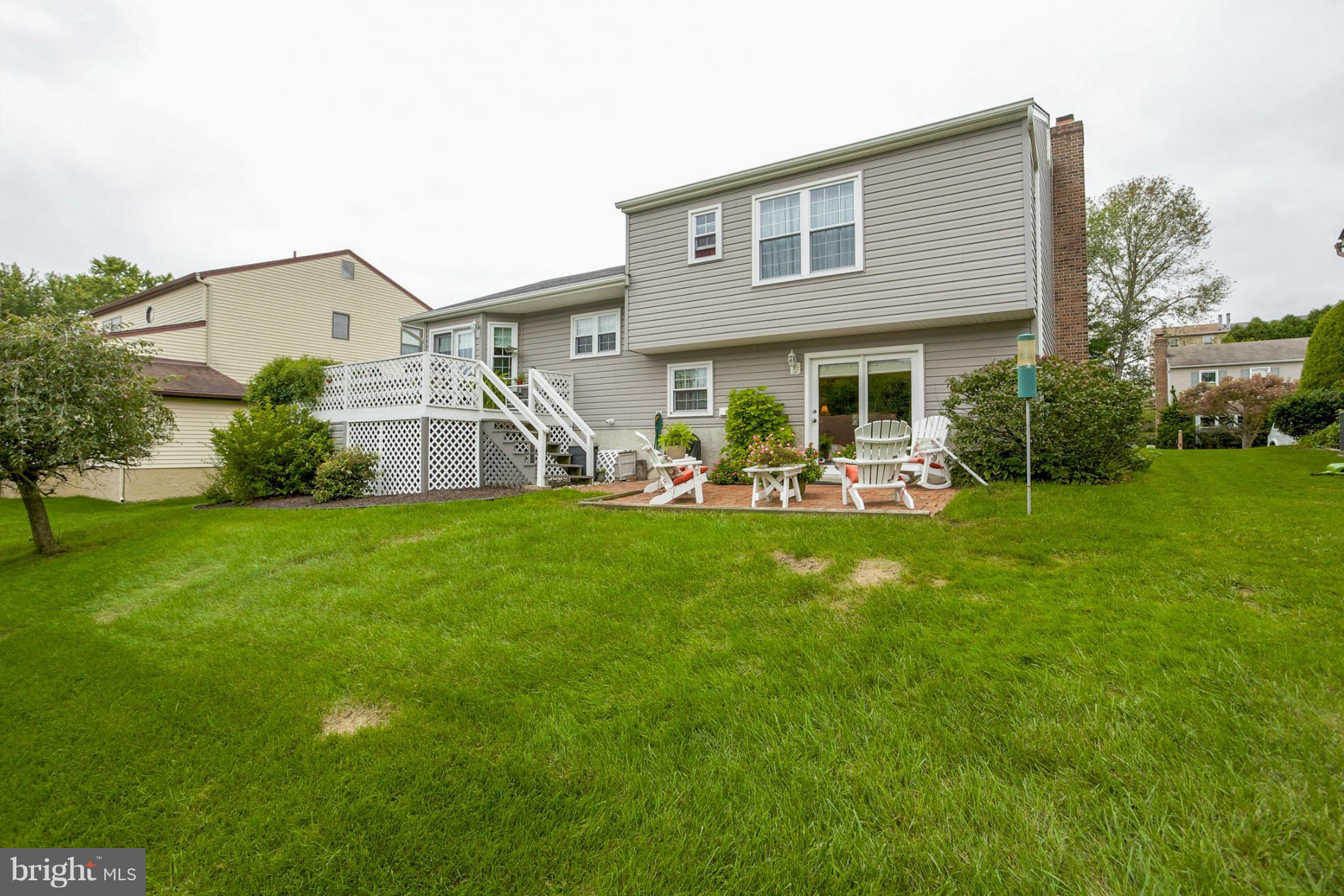 9407 Oak White Road Baltimore, MD 21236 - Photo 25 of 30 a front view of house with yard and outdoor seating