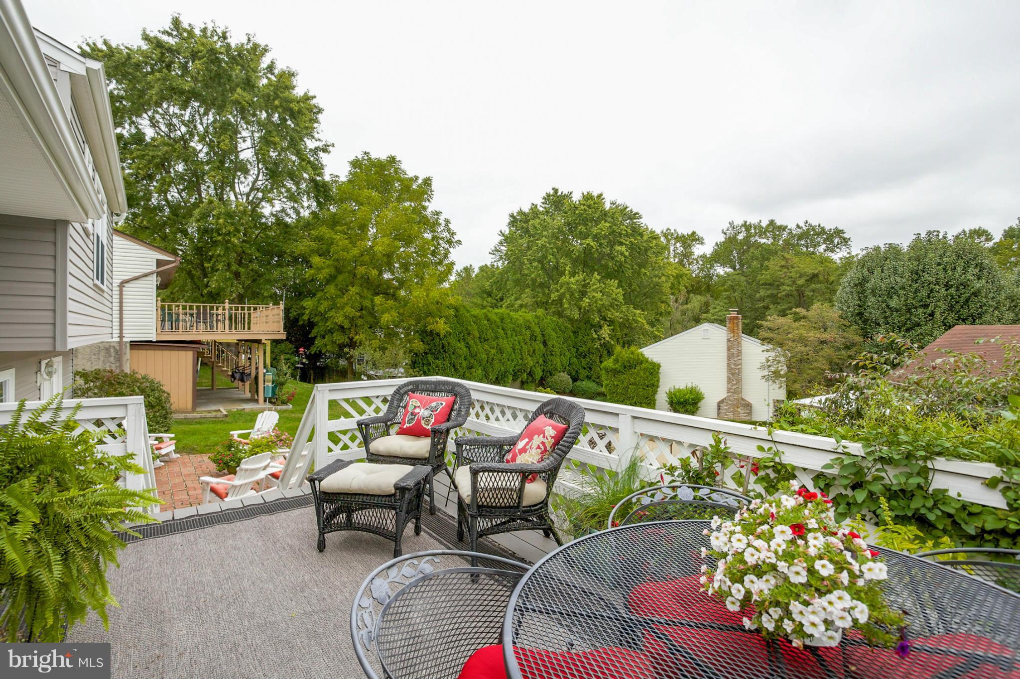 9407 Oak White Road Baltimore, MD 21236 - Photo 28 of 30 an outdoor sitting area with furniture and garden view