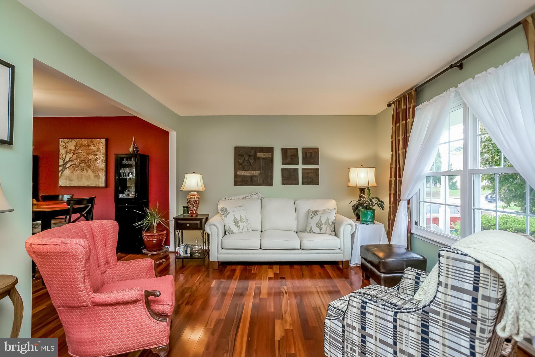 9407 Oak White Road Baltimore, MD 21236 - Photo 4 of 30 a living room with furniture and a large window