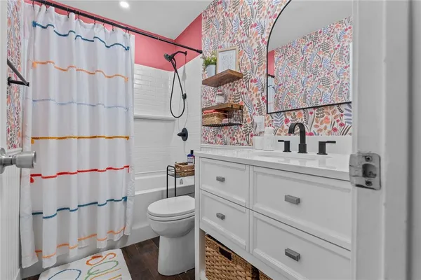 a view of a chairs and table on the patio