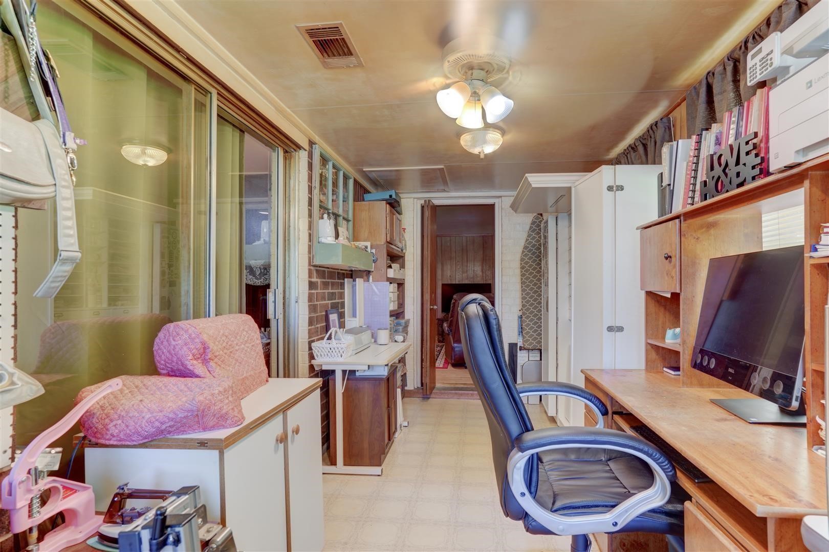 15771 1st Street Splendora, TX 77372 - Photo 16 of 47 a bathroom with a sink mirror and toilet