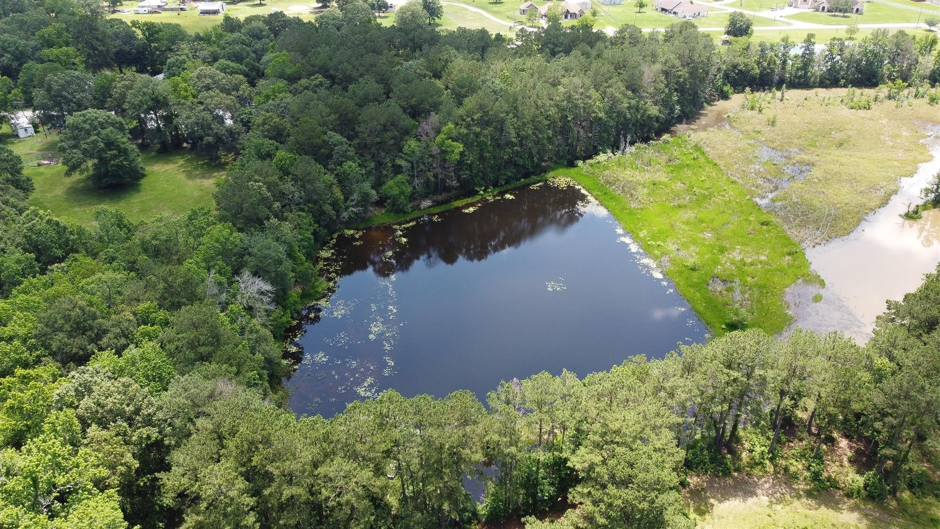 15771 1st Street Splendora, TX 77372 - Photo 44 of 47 an aerial view of a house