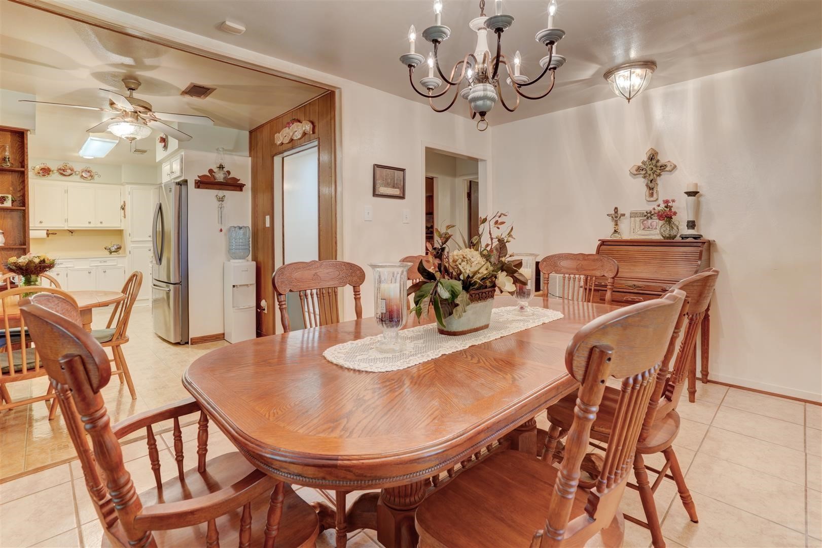 15771 1st Street Splendora, TX 77372 - Photo 8 of 47 a view of a dining room with furniture and wooden floor
