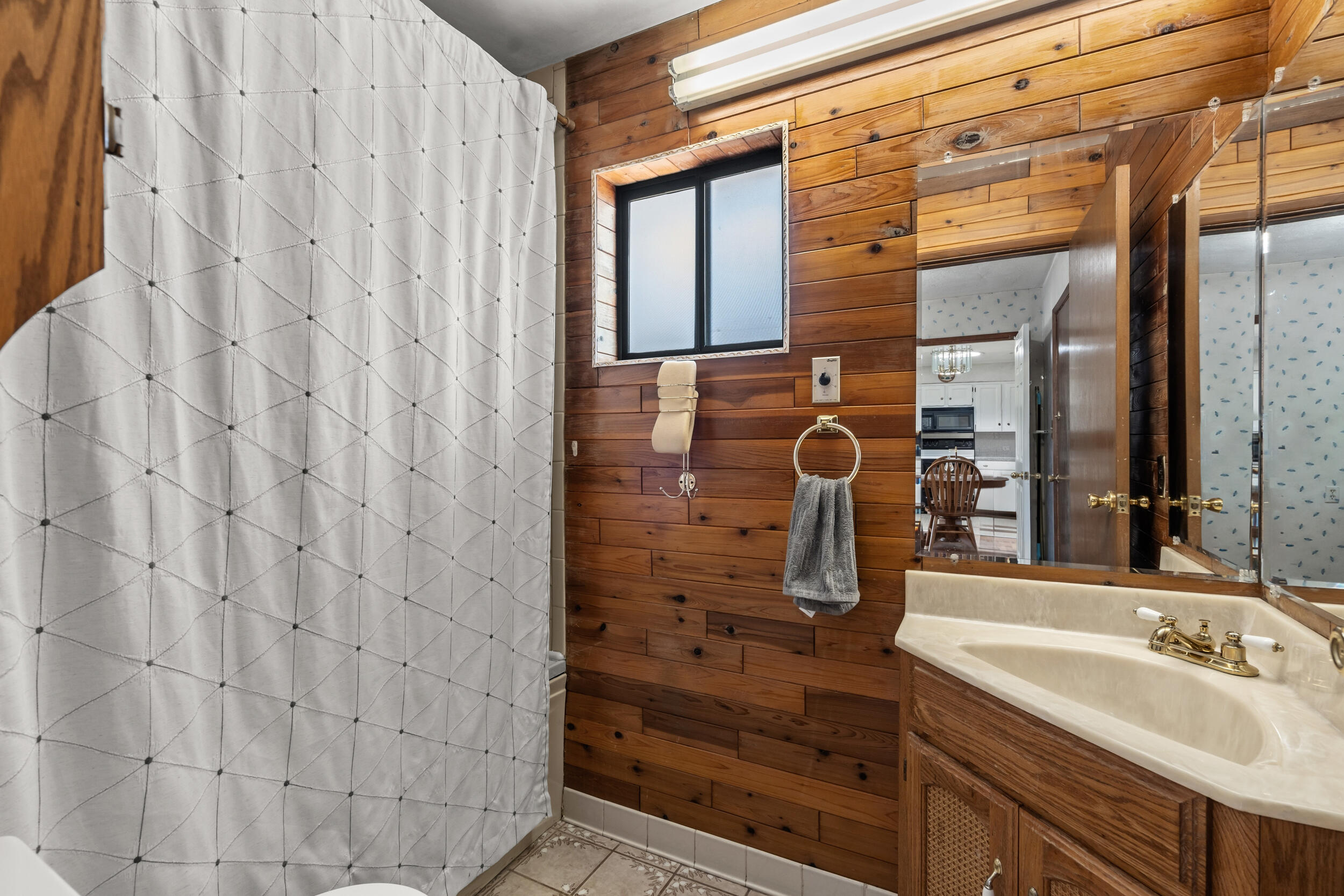 110 North 2nd Street Talent, OR 97540 - Photo 12 of 27 a bathroom with a shower and a sink