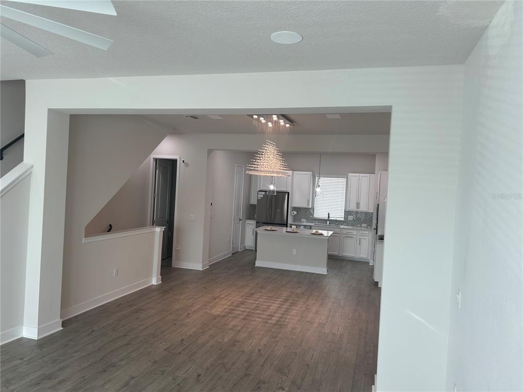2511 North Grady Avenue, Unit 34 Tampa, FL 33607 - Photo 32 of 45 a view of living room with furniture and wooden floor