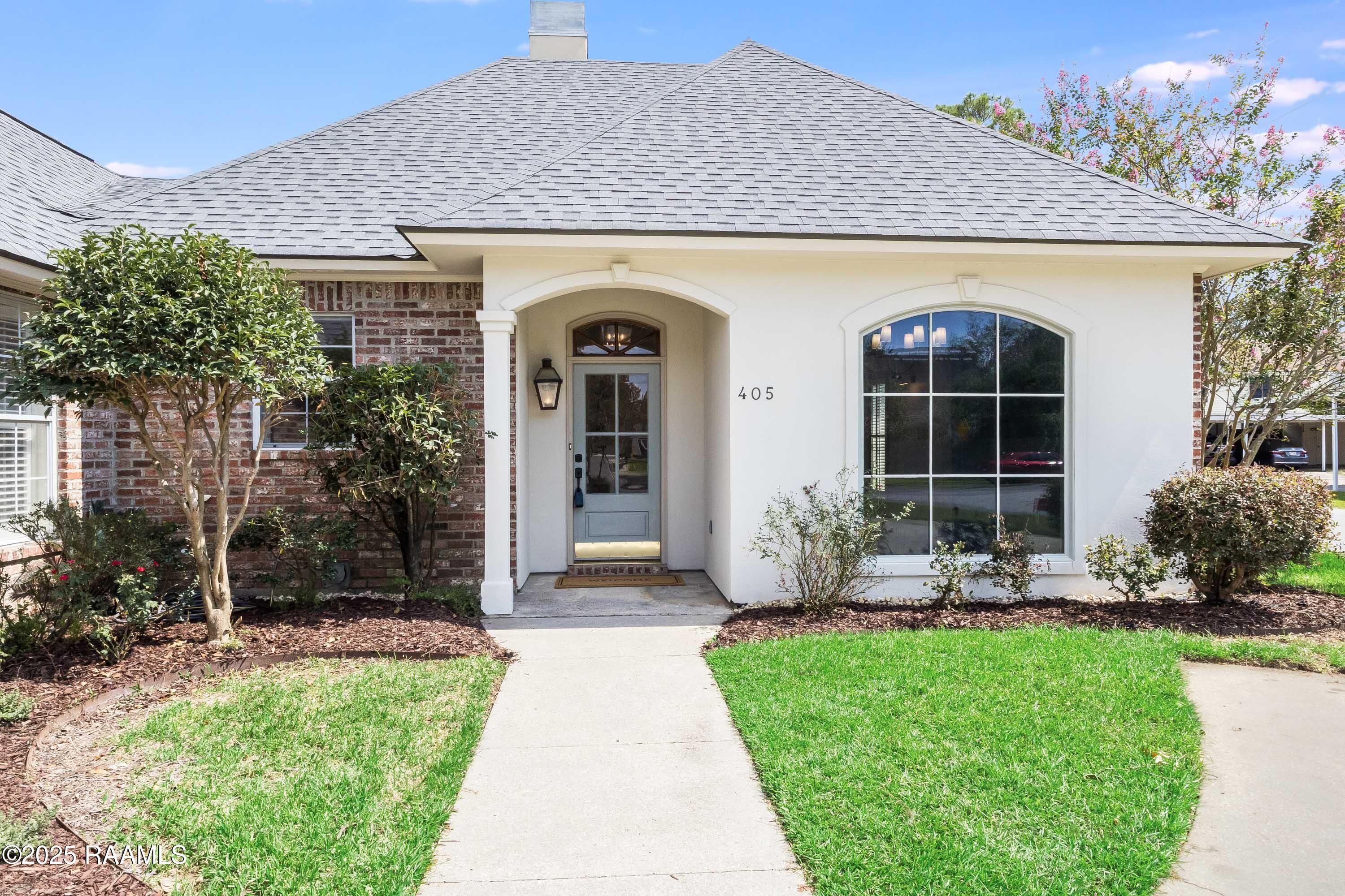 405 Cobblestone Road Lafayette, LA 70508 - Photo 1 of 28 Front of Home