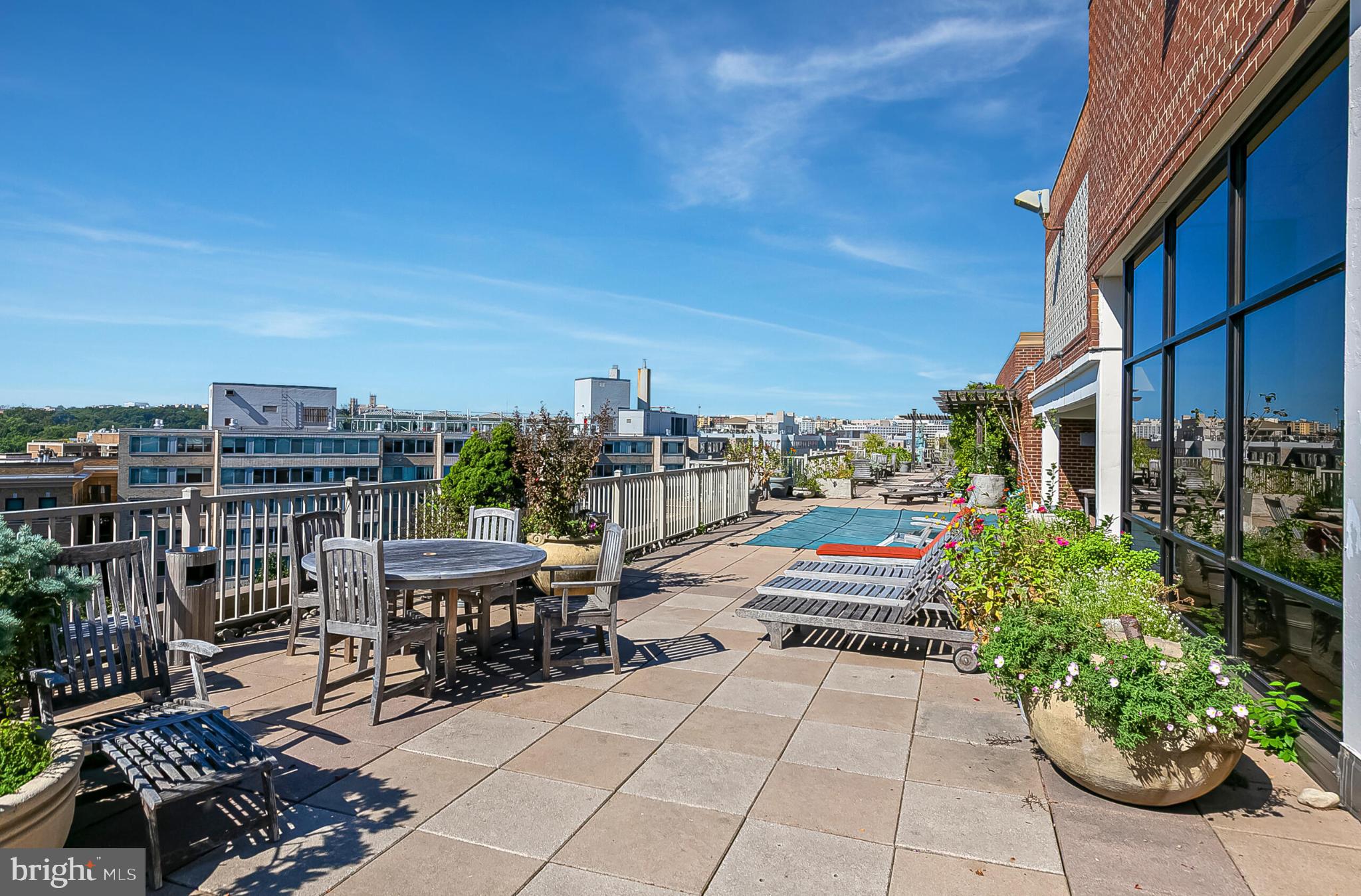 1301 20th Street Northwest, Unit 901 Washington, DC 20036 - Photo 12 of 25 a view of roof deck with patio and garden