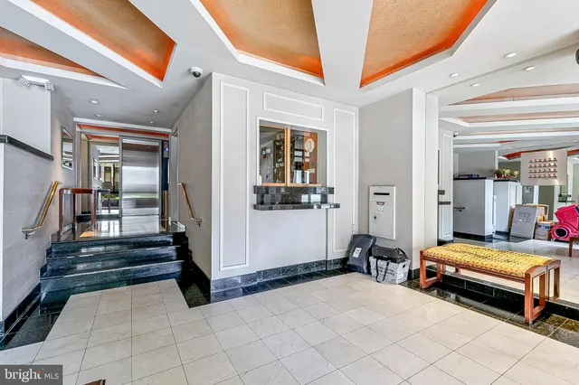 a bedroom with furniture and window