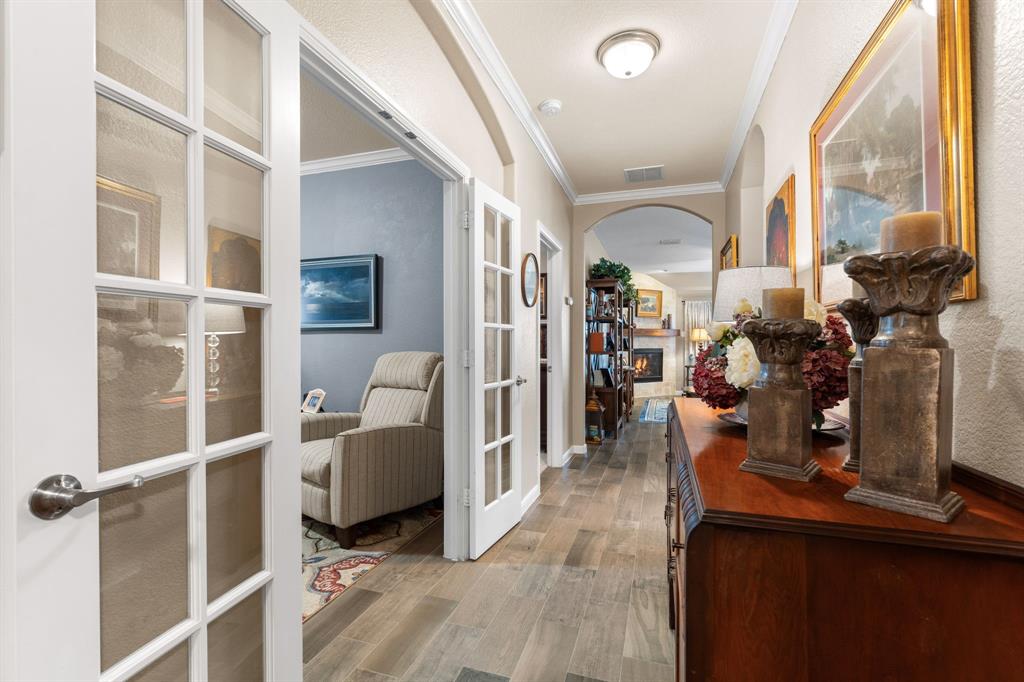 300 Copper Switch Drive Anna, TX 75409 - Photo 5 of 26 Hall entry to Bonus room / Study with glass french doors