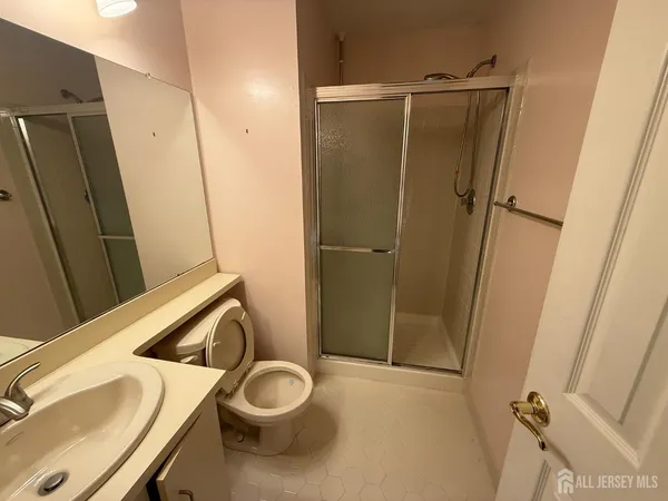 a bathroom with a sink and toilet
