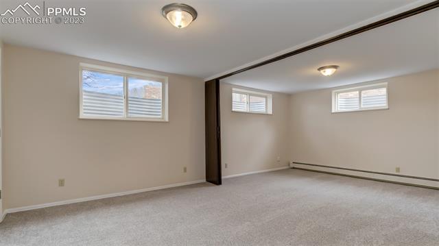 5417 Madera Road Colorado Springs, CO 80918 - Photo 34 of 43 Lower Level Bedroom 2