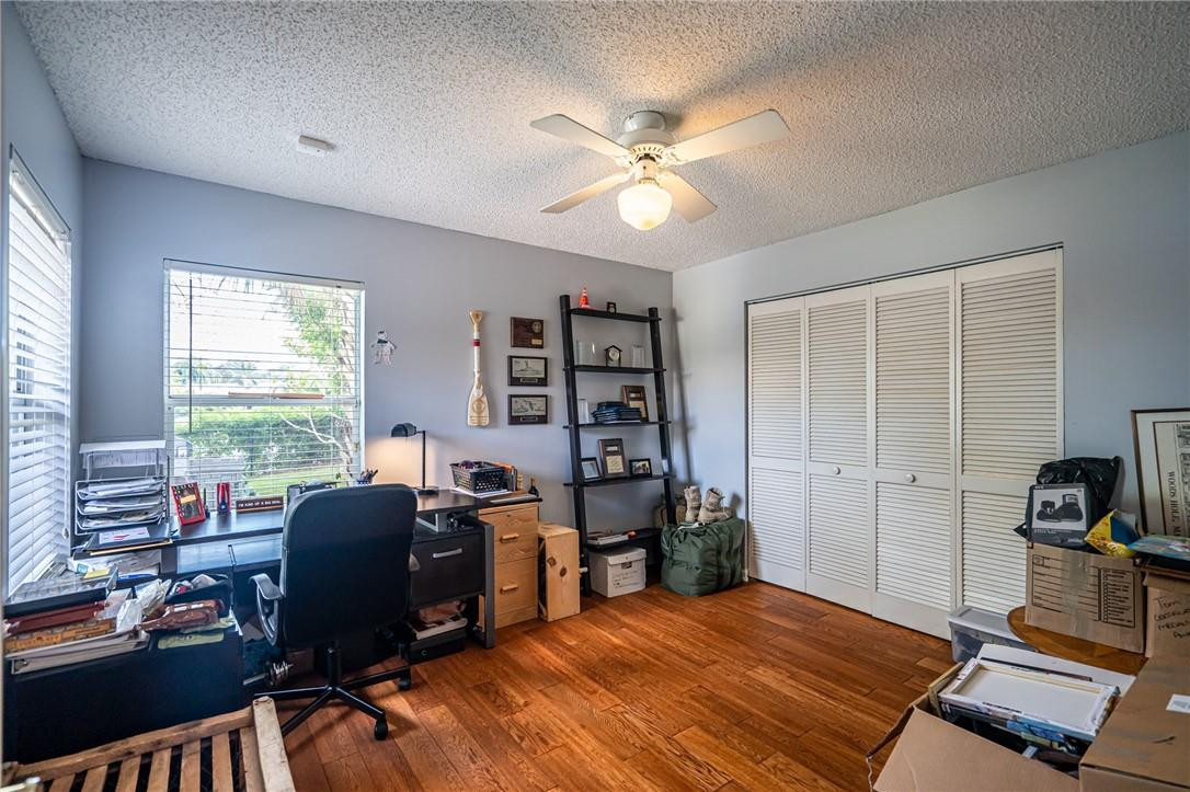 1315 Sabal Lakes Road Delray Beach, FL 33445 - Photo 23 of 38 a bedroom with a bed furniture and a window
