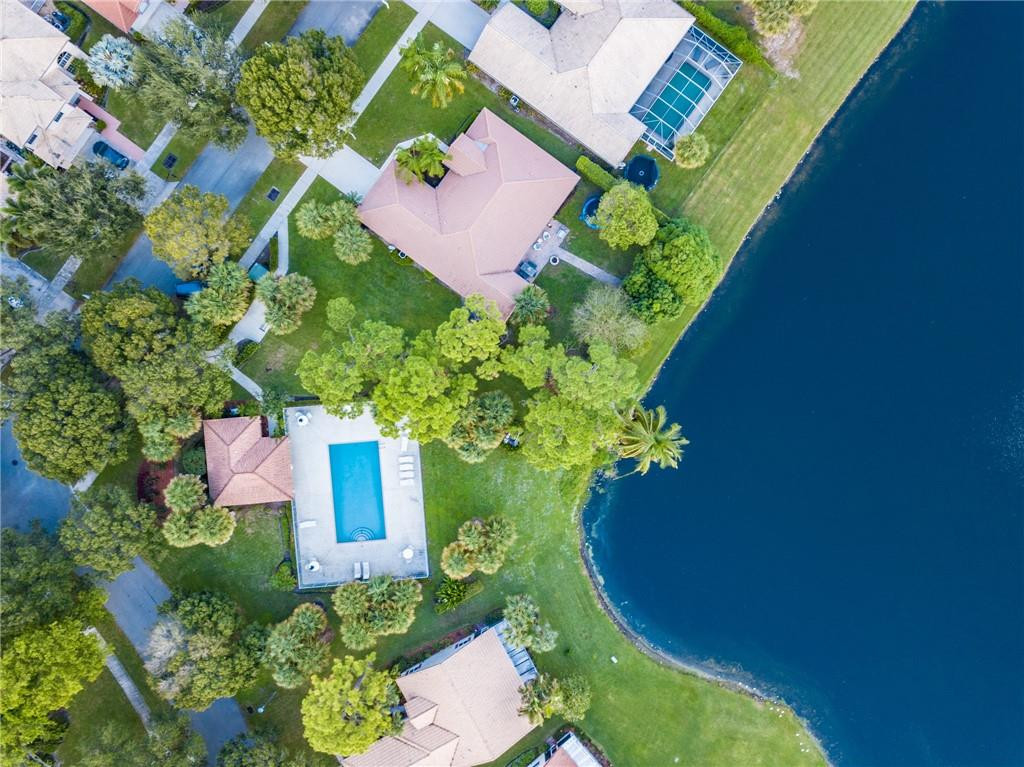 1315 Sabal Lakes Road Delray Beach, FL 33445 - Photo 35 of 38 a view of a garden