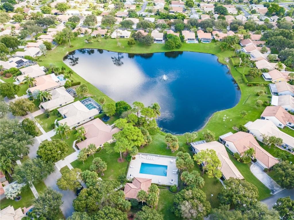 1315 Sabal Lakes Road Delray Beach, FL 33445 - Photo 36 of 38 an aerial view of a house with a lake view