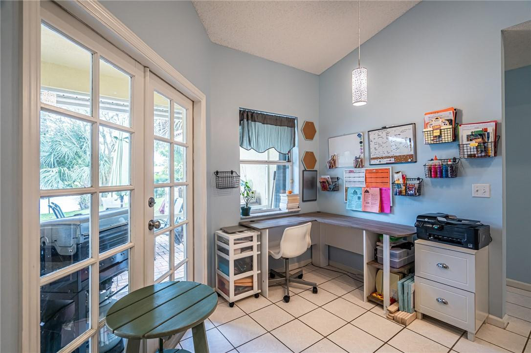 1315 Sabal Lakes Road Delray Beach, FL 33445 - Photo 8 of 38 a view of kitchen with workspace and window