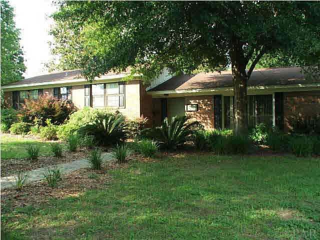 3940 McClellan Road Pensacola, FL 32503 - Photo 5 of 13 Lushly Landscaped Front Yard.