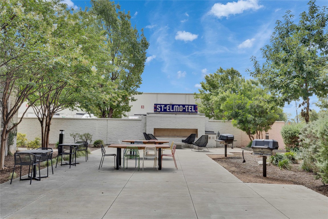 4361 South Congress Avenue, Unit 335 Austin, TX 78745 - Photo 16 of 22 a view of outdoor space with seating area and trees