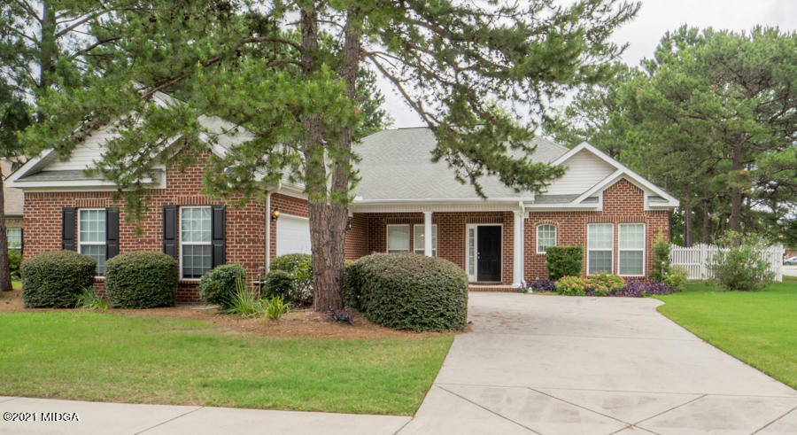 126 Timber Ridge Boulevard Byron, GA 31008 - Photo 1 of 26 a front view of a house with garden