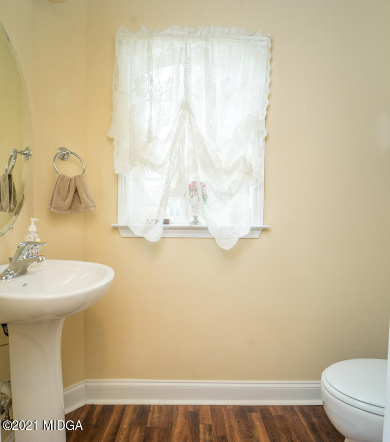 126 Timber Ridge Boulevard Byron, GA 31008 - Photo 12 of 26 a bathroom with a sink and a mirror