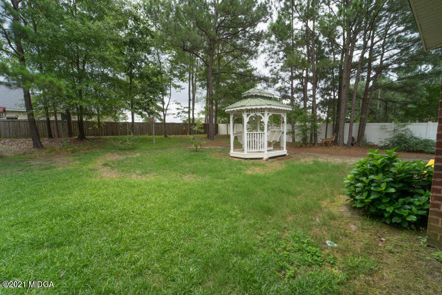 126 Timber Ridge Boulevard Byron, GA 31008 - Photo 19 of 26 a view of a house with a yard porch and sitting area