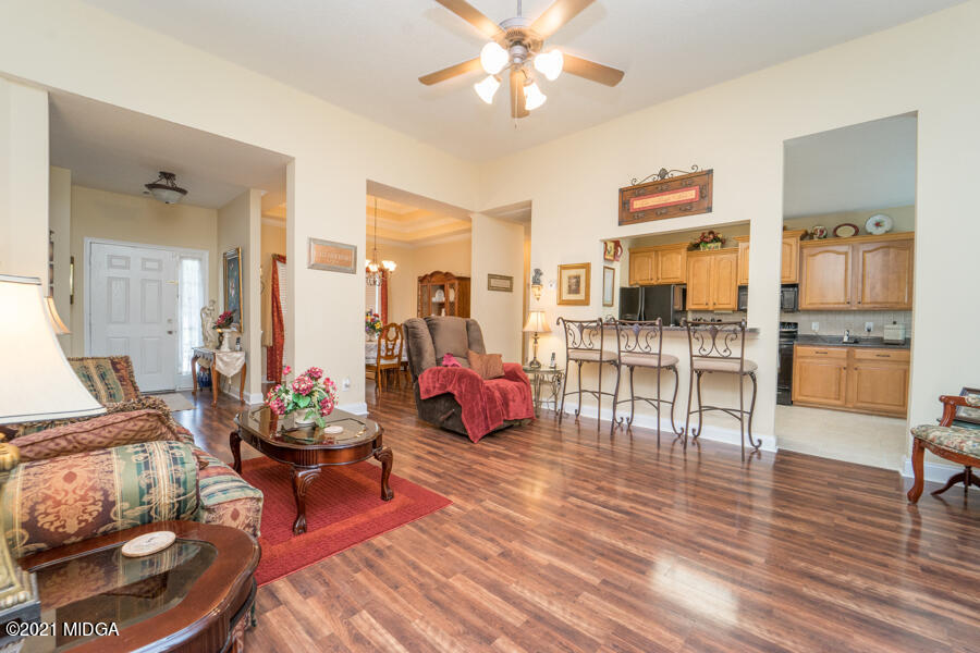 126 Timber Ridge Boulevard Byron, GA 31008 - Photo 3 of 26 a living room with furniture and wooden floor