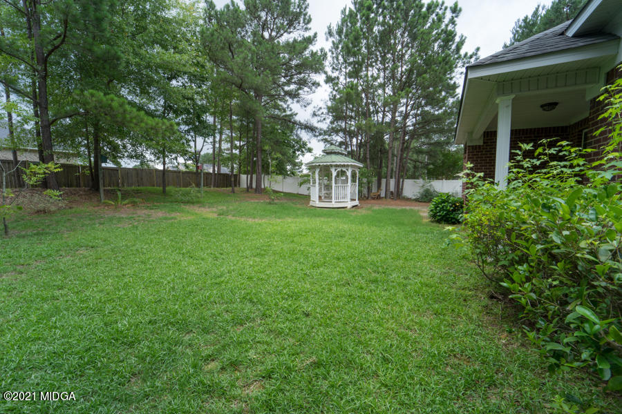 126 Timber Ridge Boulevard Byron, GA 31008 - Photo 21 of 26 a view of a house with a backyard