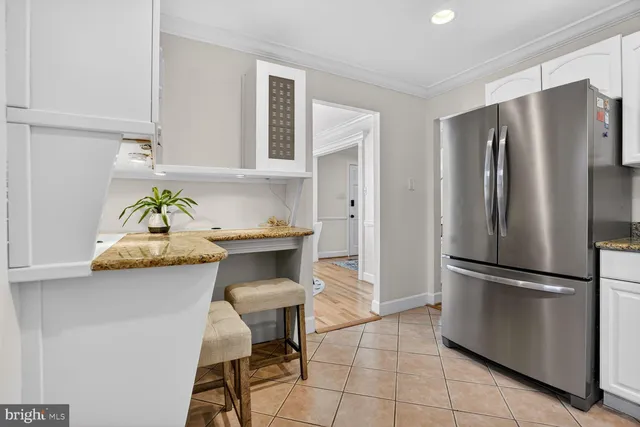 a bathroom with a sink a vanity and a mirror
