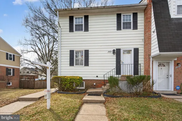 a view of entryway dining room and hall with wooden floor