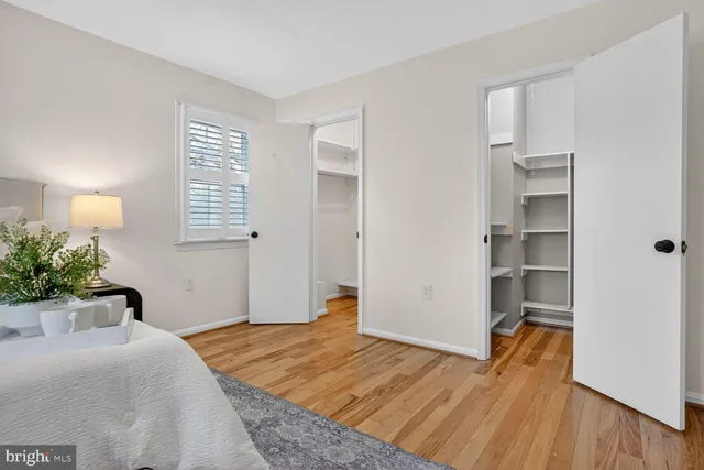 a view of a swimming pool with a slide and bench