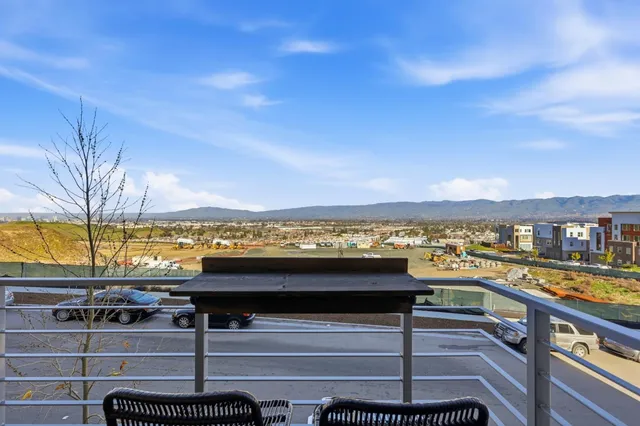 a view of swimming pool with outdoor seating