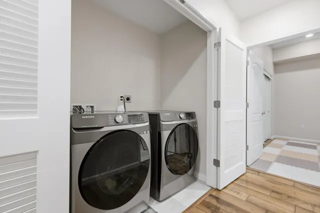 a utility room with dryer and washer