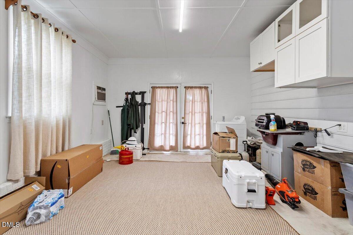 8604 Lobelia Street Raleigh, NC 27603 - Photo 27 of 27 a bedroom with furniture and a window