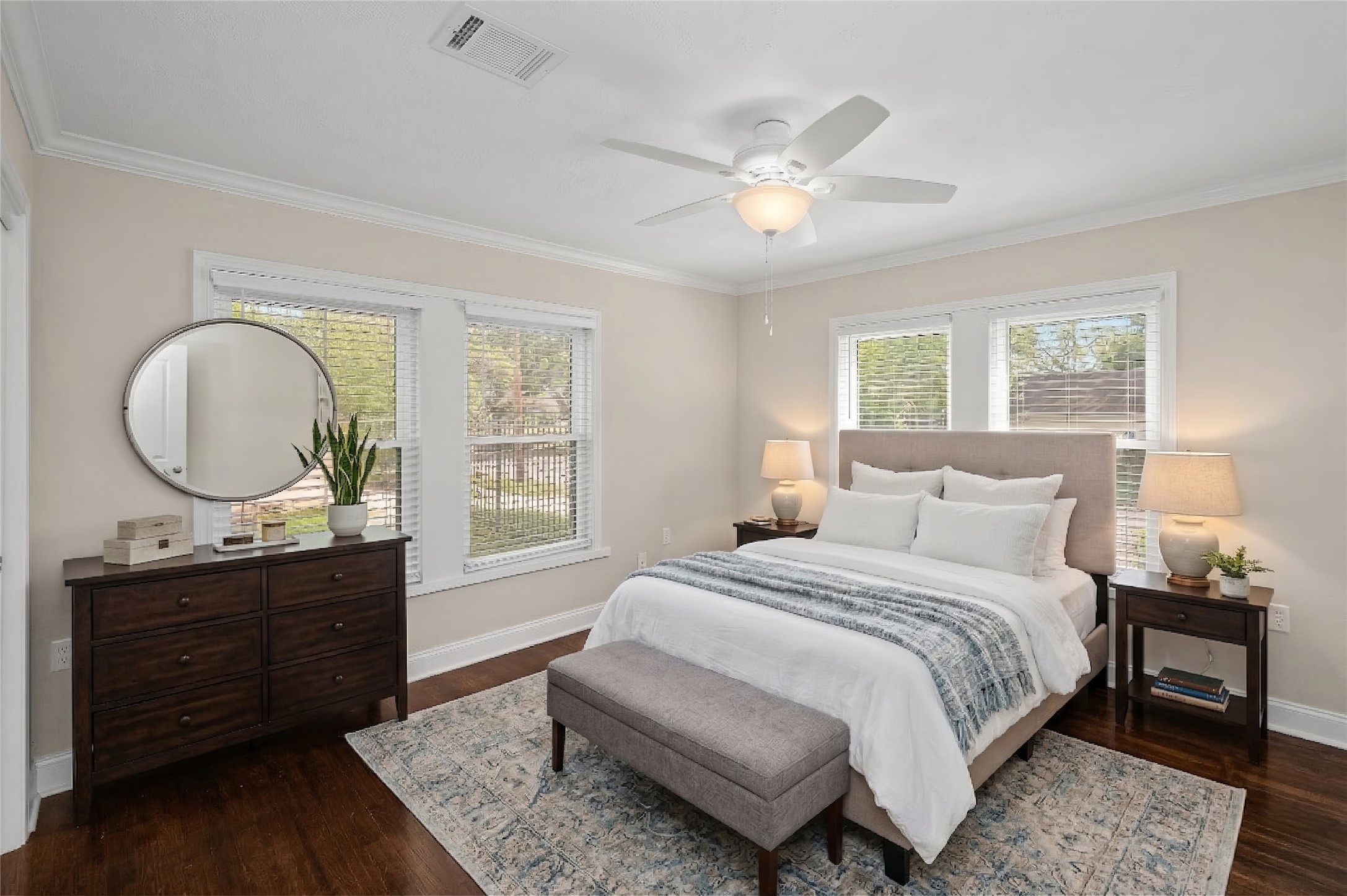 6673 Sylvan Road Houston, TX 77023 - Photo 23 of 39 a bedroom with a large bed and a dresser