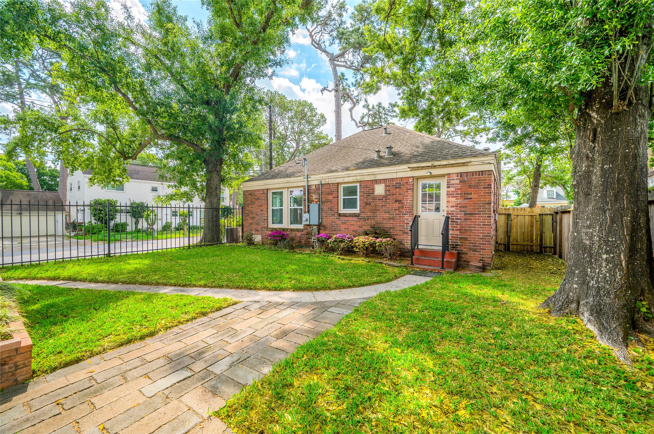 6673 Sylvan Road Houston, TX 77023 - Photo 34 of 39 a front view of a house with a yard