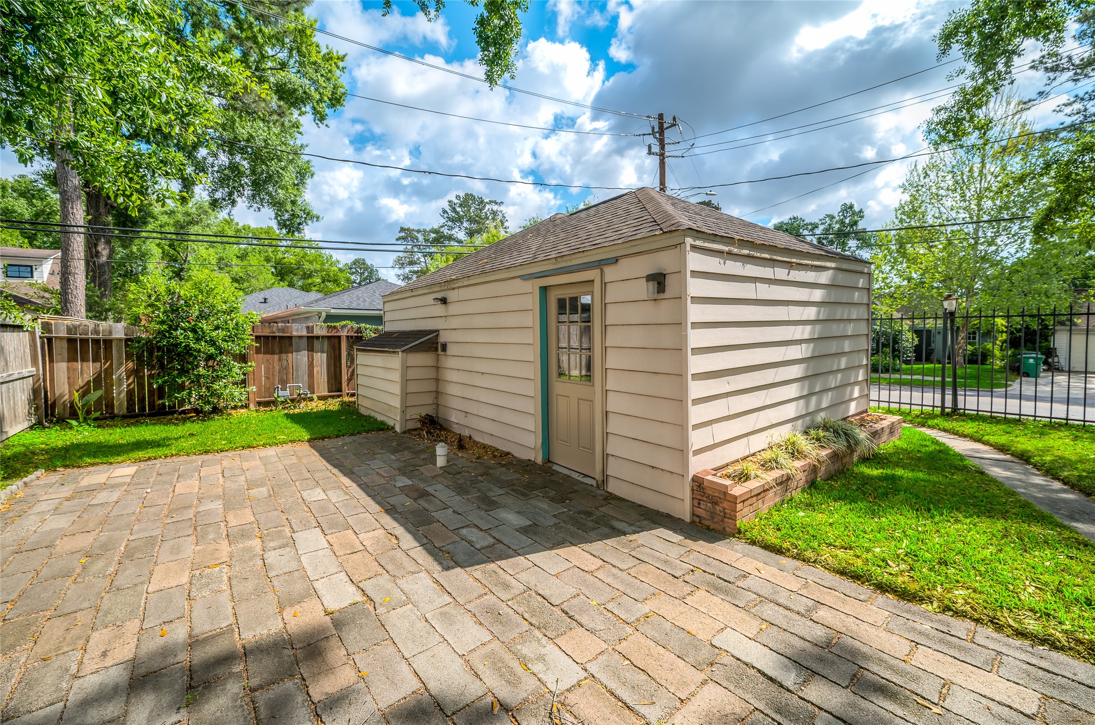 6673 Sylvan Road Houston, TX 77023 - Photo 35 of 39 a view of a white house with a yard