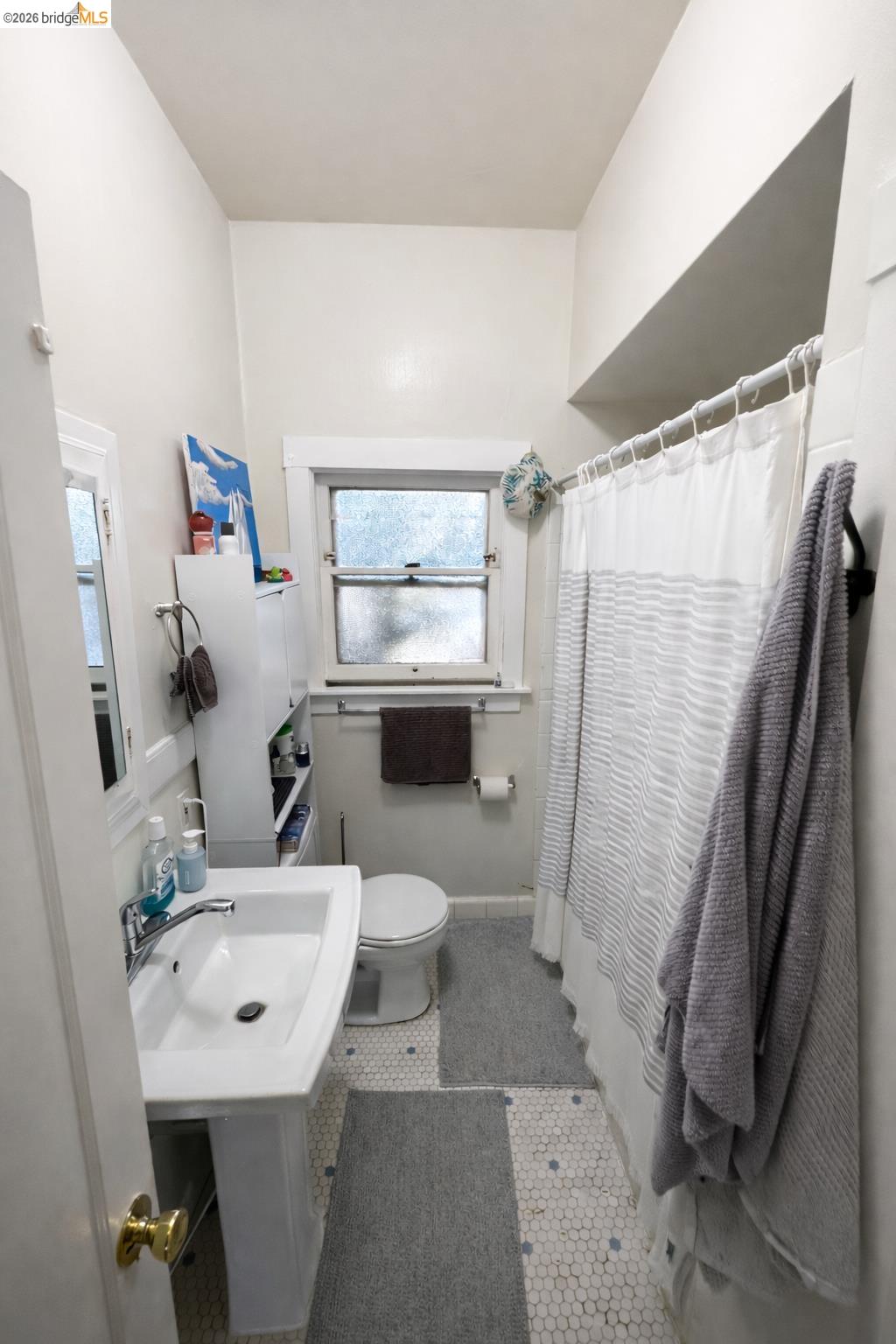 6100 Chabot Road Oakland, CA 94618 - Photo 22 of 28 Full bath featuring toilet and light tile patterned flooring