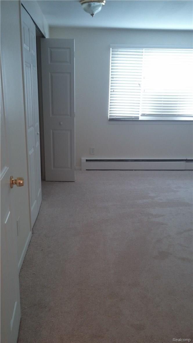 1123 Tienken Court, Unit 11 Rochester, MI 48306 - Photo 6 of 19 0623161511b (1).jpg