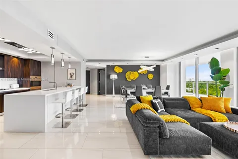 a bath tub sitting next to a shower