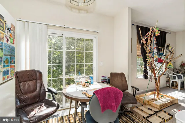 a workspace with furniture and a window