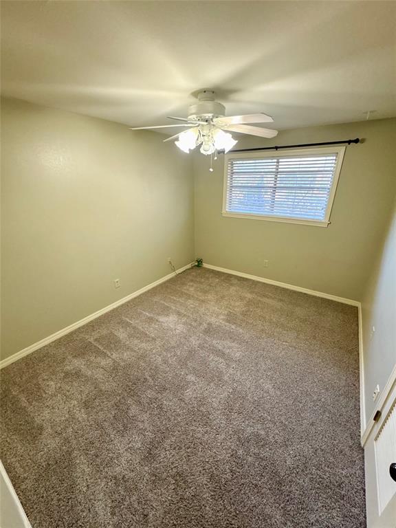 710 Robards Street Shreveport, LA 71105 - Photo 10 of 12 an empty room with a empty space and windows