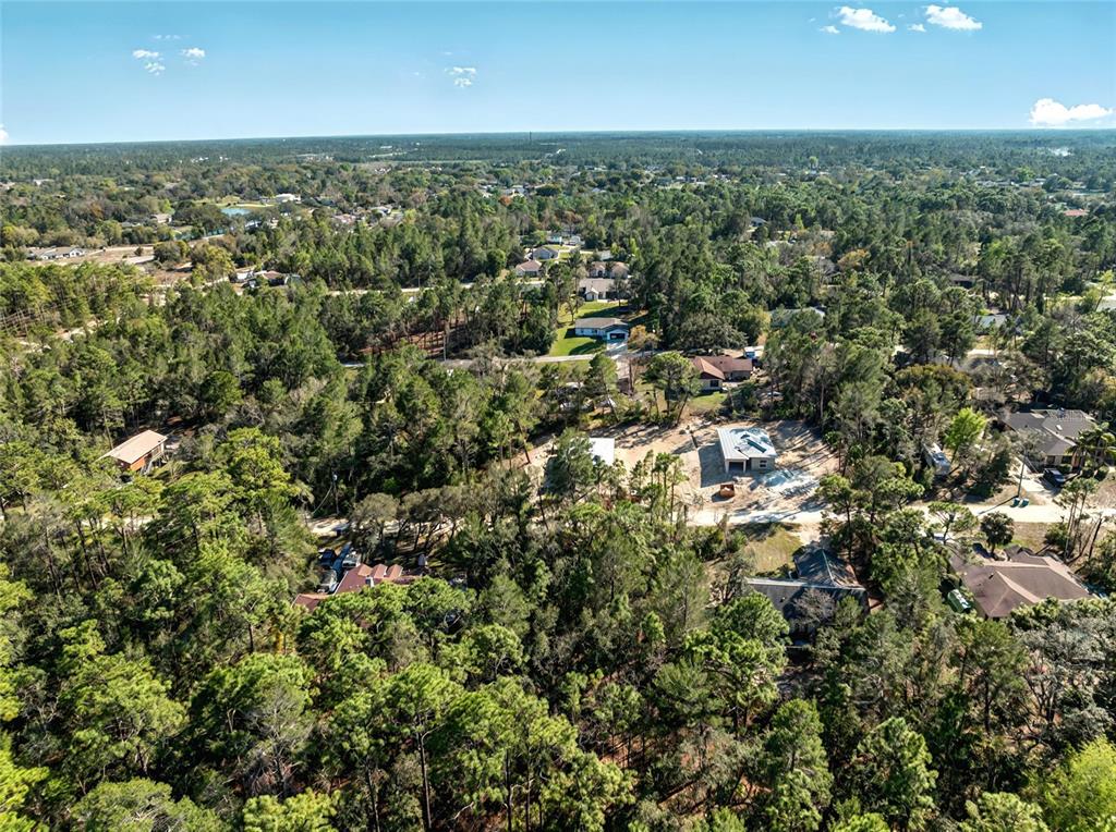 9003 Glenarm Way Weeki Wachee, FL 34613 - Photo 11 of 12 an aerial view of residential houses with city view