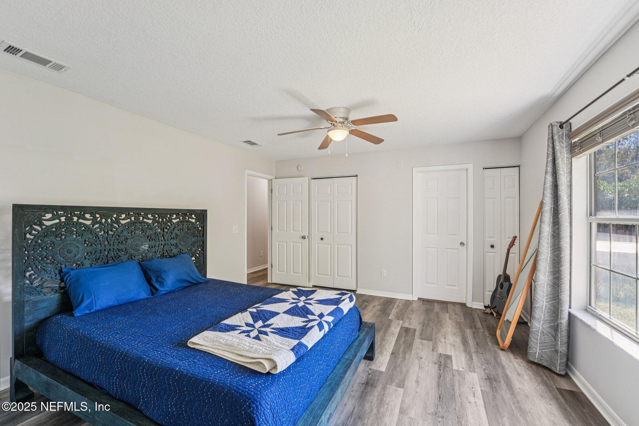 502 Royal Road St. Augustine, FL 32086 - Photo 15 of 34 a living room with furniture and a wooden floor